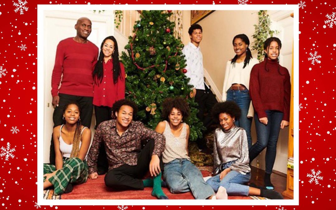 The Kanneh-Mason Family in front of a Christmas Tree